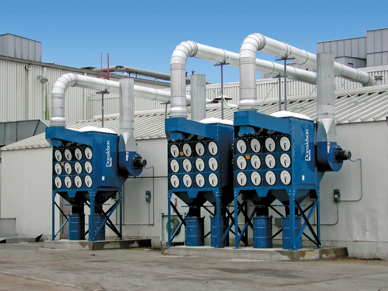 A Donaldson brand dust collector system installation.